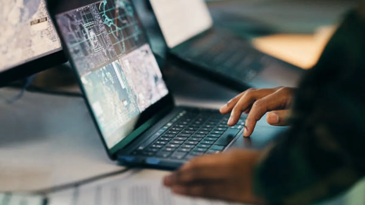 low angle photography of brown and gray helicopter